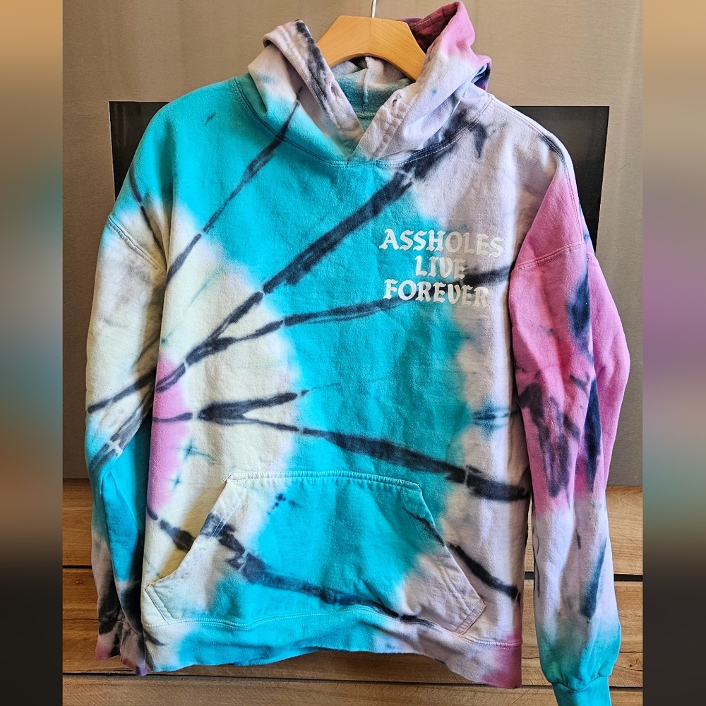 Vibrant Pink and Blue Tie-Dye Sweater with Radiant Design